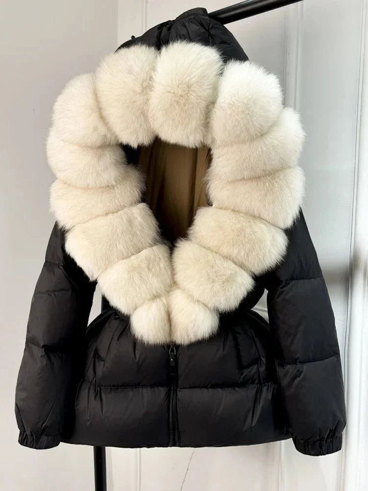 Women's long puffer jacket with fur hood - lifestyle photo