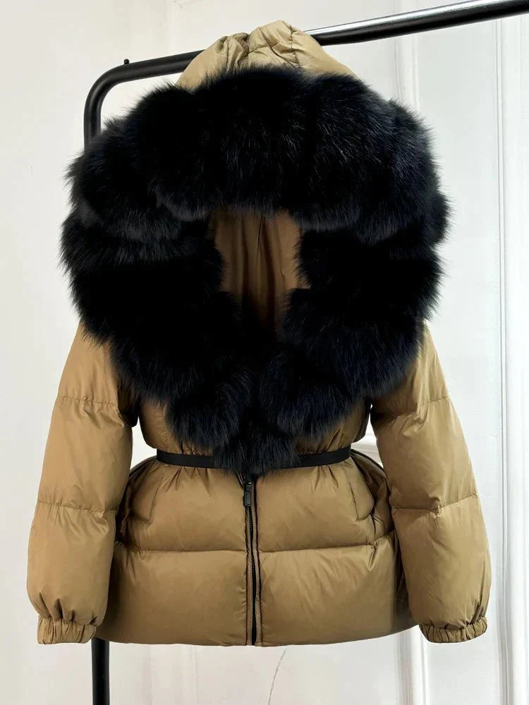 Women's long puffer jacket with fur hood - lifestyle photo