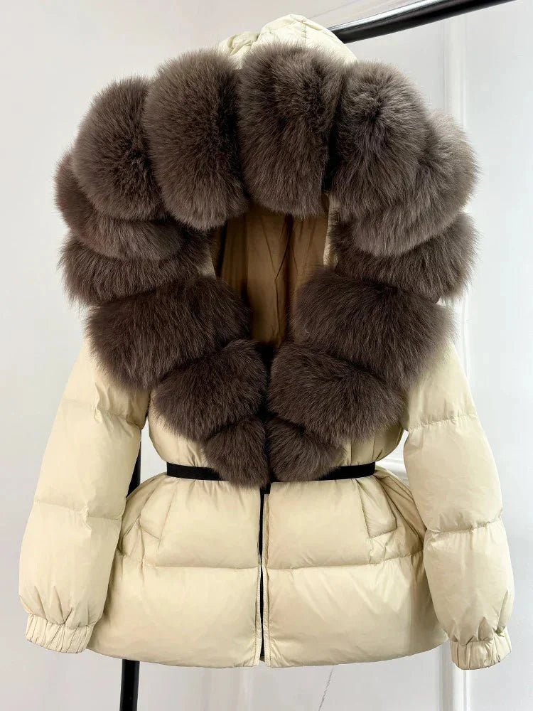 Women's long puffer jacket with fur hood - lifestyle photo
