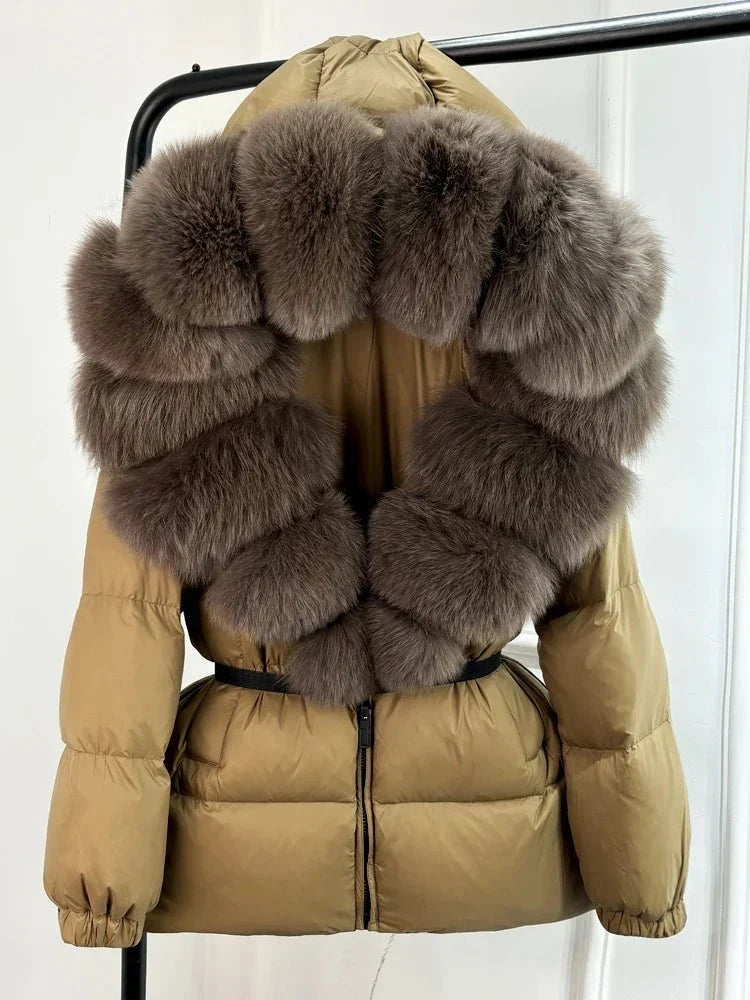 Women's long puffer jacket with fur hood - lifestyle photo