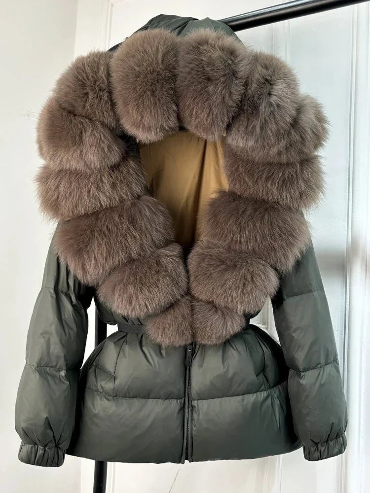 Women's long puffer jacket with fur hood - lifestyle photo