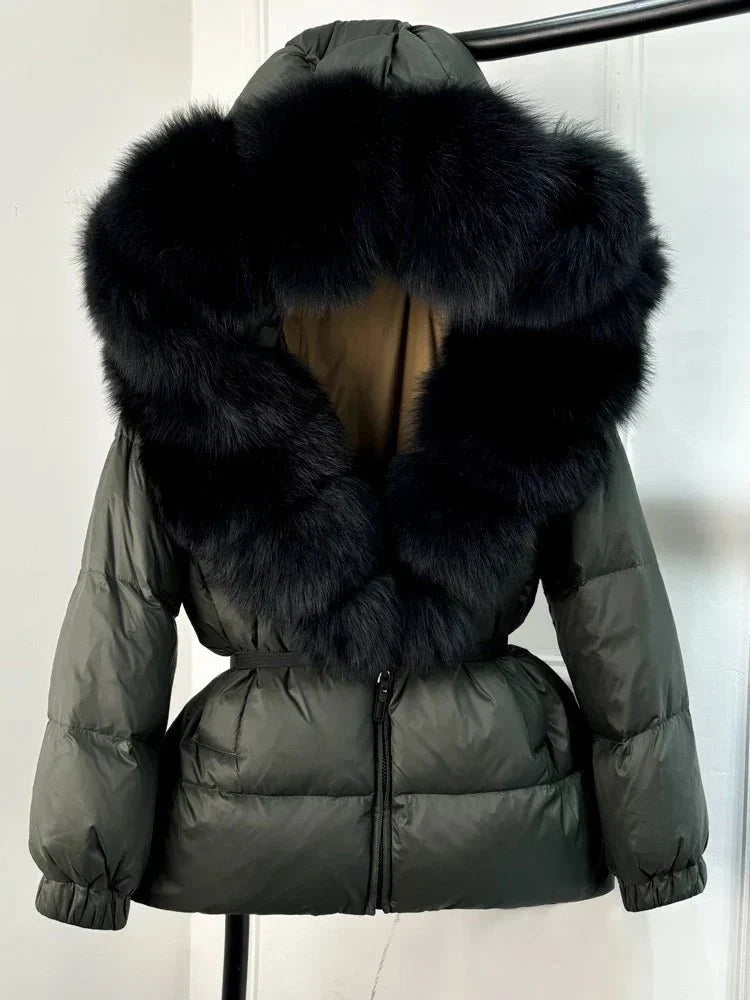 Women's long puffer jacket with fur hood - lifestyle photo