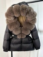 Women's long puffer jacket with fur hood in Black Brown